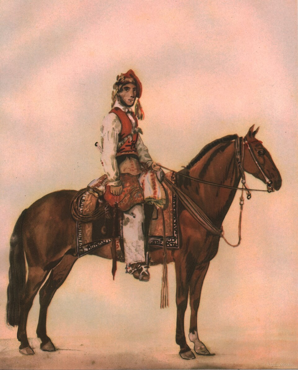 Joven huaso a caballo con gorro rojo