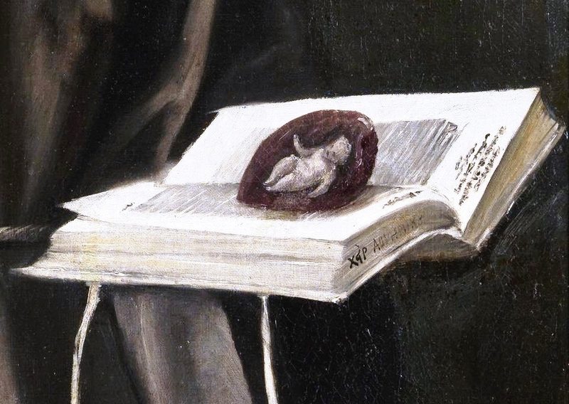 Detalle de una pintura que muestra un libro abierto sobre — El Greco