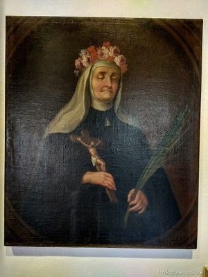 Escudo religiosa con corona flores y crucifijo