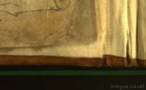 Detalle de un libro antiguo con páginas amarillentas y encuadernación de cuero