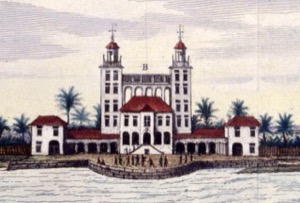 Magnífico edificio con torres y palmeras frente al agua — Fribourg Palace Recife
