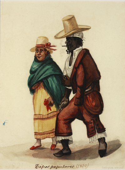 Pareja con sombreros y trajes típicos