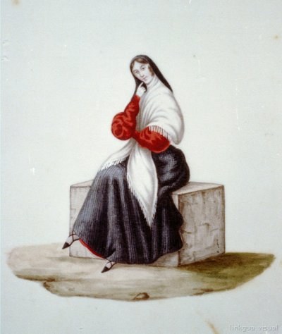 Mujer sentada con mantilla y falda ancha