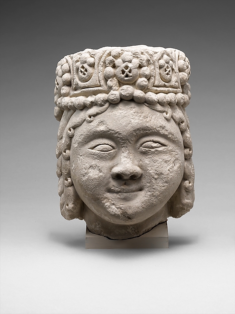 Research head from a figure with a beaded headdress — Research