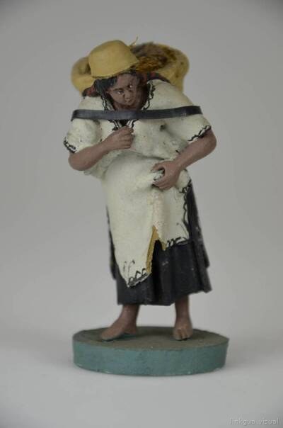 Figura de tipo: Mujer con equipaje