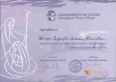 Diploma del Ayuntamiento de Cáceres a favor del Hogar Infantil "Julian Murillo" — Hogar Infantil Julián Murillo (Cáceres, España)