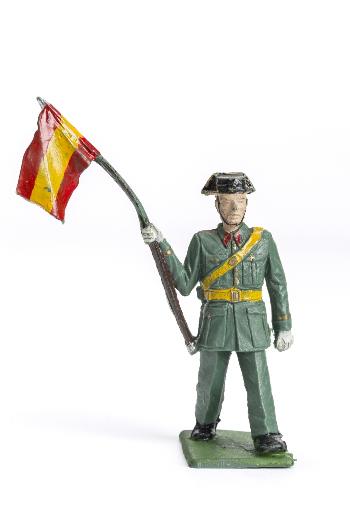 Figura de plomo de un guardia civil con bandera de España