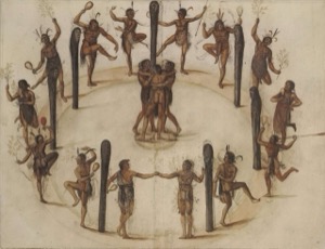 Danza ceremonial de nativos americanos alrededor de postes