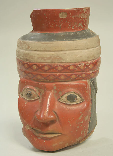Face from Bottle — Wari